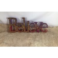 Believe Zeichen von FrogHollowStudio