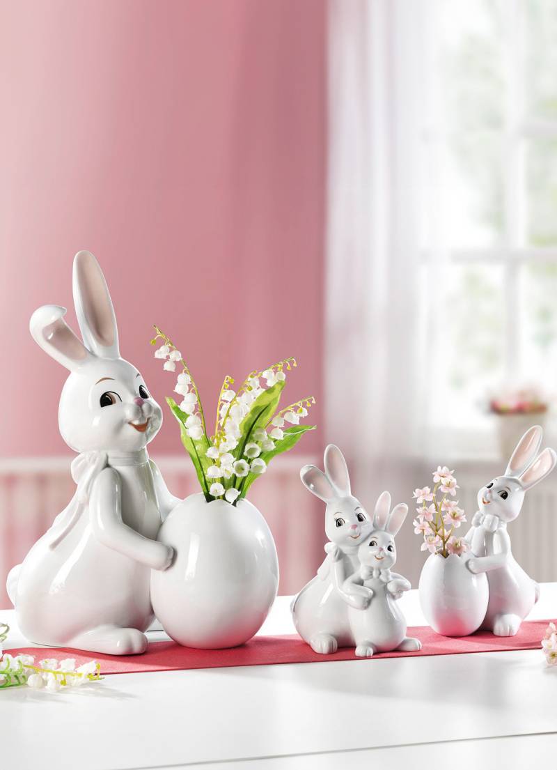 Lustige Hasen aus Porzellan, Hase mit Ei-Vase, klein, Weiss Lustige Hasen aus Porzellan, Hase mit Ei-Vase, klein, Weiss von GOEBEL