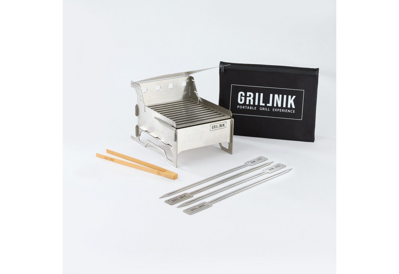 GRILLNIK Holzkohlegrill Kompakter Premium Edelstahlgrill Größe S–Tragbarer Holzkohlegrill, Kompakter Premiumgrill – robust, mobil, vielseitig von GRILLNIK