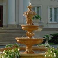 Imposanter Kaskadenbrunnen aus Steinguss mit Löwen Wasserspeiern und Putten Figur - Marcello / Tyrolia von Gartentraum.de