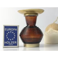 Vintage Kerzenständer Aus Glas Mit Messingfarbenem Tropfteller/Kerzenhalter Messing Braun Amberfarben 9cm 3.5" Vintage Kerzenständer Aus Glas Mit Messingfarbenem Tropfteller/Kerzenhalter Messing Braun Amberfarben 9cm 3.5" von Gernewieder