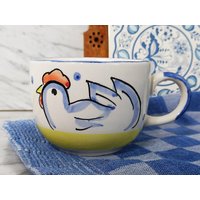 Vintage Tasse/Großer Kaffeebecher Mit Motiv "Huhn" 1990Er Söndgen Keramik Germany Vintage Tasse/Großer Kaffeebecher Mit Motiv "Huhn" 1990Er Söndgen Keramik Germany von Gernewieder