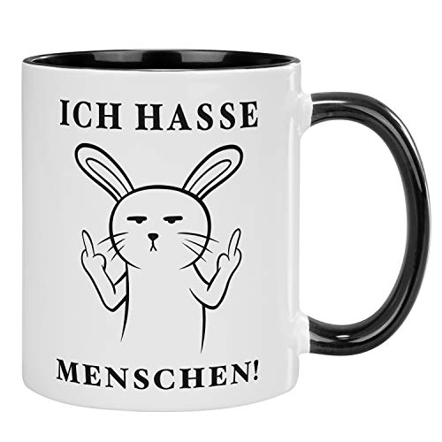 Geschenke 24 Tasse - Ich hasse Menschen - originell bedruckter Kaffeebecher mit lustigem Comic-Motiv und Spruch, mehrfarbig (Schwarz, Hase) von Geschenke 24