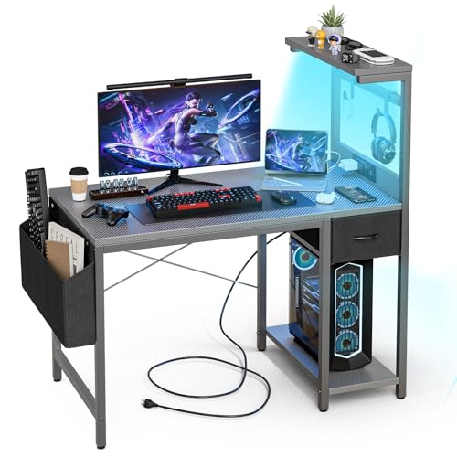Grandder Gaming Tisch, 120 cm Gaming Schreibtisch mit Steckdose & LED-Beleuchtung, Computertisch mit reversiblen Regalen und Schublade, PC-Schreibtisch für Homeoffice mit Staufach, Carbonoptik Grau Grandder Gaming Tisch, 120 cm Gaming Schreibtisch mit Steckdose & LED-Beleuchtung, Computertisch mit reversiblen Regalen und Schublade, PC-Schreibtisch für Homeoffice mit Staufach, Carbonoptik Grau von Grandder