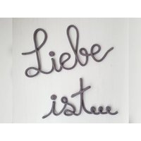 Liebe Ist... Schriftzug Aus Draht, Hochzeit, Fotowand, Wanddeko Liebe Ist... Schriftzug Aus Draht, Hochzeit, Fotowand, Wanddeko von HELLOworldSK