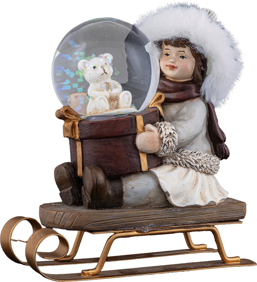 HGD Schneekugel HW65-2245, Winterkind mit Schlitten und Schneekugel, detaillierte, weihnachtliche Dekoration für saisonale Atmosphäre von HGD