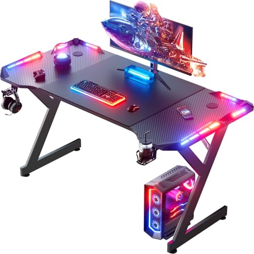 HLONONE LED Gaming Schreibtisch 120 x 60 cm, Gaming Tisch mit LED, Stabiler PC Tisch mit Kohlefaserbeschichtung, Gamer Tisch mit Getränkehalter und Kopfhörerhaken, Schwarz von HLONONE