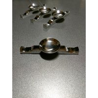 Satz Von 4 Stahl Löffelablage Und Stick Rest Mit Leuchtenden von Halfearcat