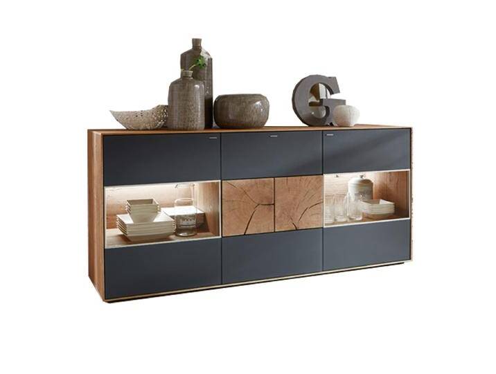 Hartmann Caya Sideboard 4174A in Massiv Kerneiche Umato mit Front in Mattglas Anthrazit mit Glasfächern und Hirnholzakzent 3-türig mit 1 Schubkasten Hartmann Caya Sideboard 4174A in Massiv Kerneiche Umato mit Front in Mattglas Anthrazit mit Glasfächern und Hirnholzakzent 3-türig mit 1 Schubkasten von Hartmann