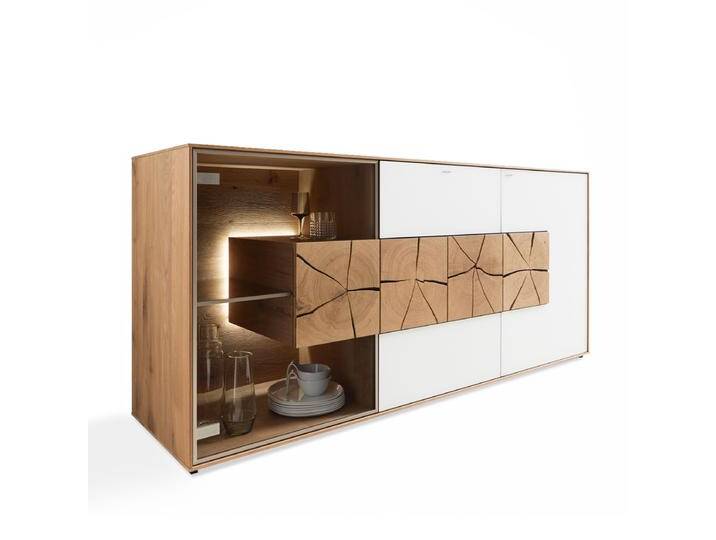 Hartmann Caya Sideboard Korpus in Massiv Kerneiche Umato Front in Mattglas weiß oder anthrazit mit Hirnholzapplikation Glastür mit Hirnholzblock Hartmann Caya Sideboard Korpus in Massiv Kerneiche Umato Front in Mattglas weiß oder anthrazit mit Hirnholzapplikation Glastür mit Hirnholzblock von Hartmann