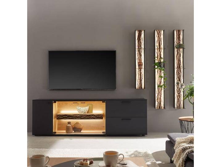 Hartmann Runa Wohnwand V48 in Kerneiche Massivholz mit Rindenapplikation bestehend aus TV-Unterteil sowie 3 Metallregalen Beleuchtung wählbar Hartmann Runa Wohnwand V48 in Kerneiche Massivholz mit Rindenapplikation bestehend aus TV-Unterteil sowie 3 Metallregalen Beleuchtung wählbar von Hartmann