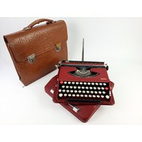 Gossen Tippa Roter Kräusellack Vintage Schreibmaschine Mit Original Ledertasche Von 1950 Bedienungsanleitung von Hogusch