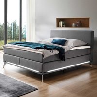 Boxspring Bett in Hellgrau und Chrom LED Beleuchtung von Homedreams