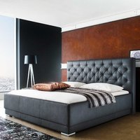 Doppelbett in Schwarz Kunstleder gestepptem Kopfteil von Homedreams