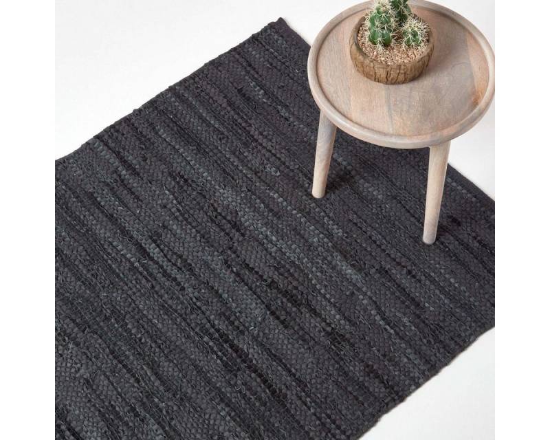 Homescapes Teppich Schwarzer Leder-Webteppich Denver, 150 x 240 cm, Höhe: 20 mm Homescapes Teppich Schwarzer Leder-Webteppich Denver, 150 x 240 cm, Höhe: 20 mm von Homescapes