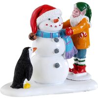 Schneemann bauen - Weihnachtsdorf Dekoration Schneemann bauen - Weihnachtsdorf Dekoration von IPERBRIKO