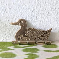 Vintage Schlüsselbrett Entenfamilie Messing Hakenleiste 4 Haken Mid Century von Ikatisart