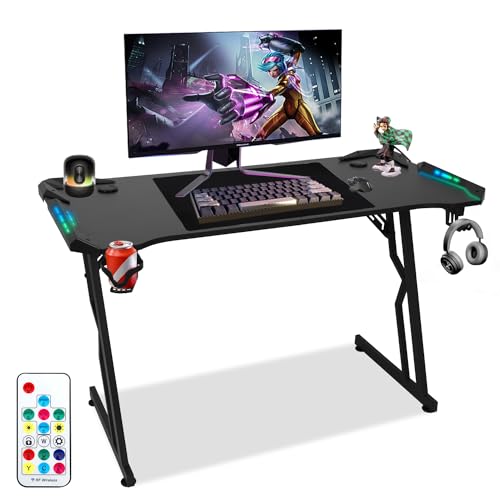 Ikodm Gaming Schreibtisch 120 x 60cm, Gaming Tisch mit LED, Stabiler Gamer Tisch, PC Tisch Gaming mit Kohlefaserbeschichtung, Computertisch mit Getränkehalter und Kopfhörerhaken, Schwarz von Ikodm
