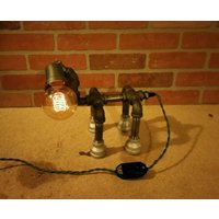 Vier Beinen Akzent Lampe von IronAndLightDesign