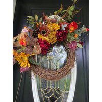 Herbsttürkränze Burgunderrot Türkränze Sonnenblumen Herbstkranz Weinrebe Etsy Orangenkranz Erntekranz von IvannaWreaths