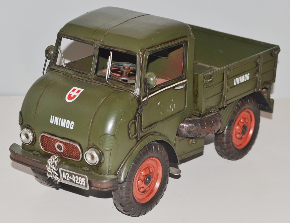 Blechauto Nostalgie Modellauto Oldtimer Automarke Unimog Modell Typ 401 Froschauge aus Blech L 32 cm Blechauto Nostalgie Modellauto Oldtimer Automarke Unimog Modell Typ 401 Froschauge aus Blech L 32 cm von JS GartenDeko