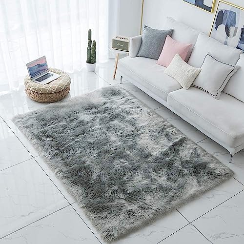 JXLOULAN Faux Lammfell Schaffell Teppich Grau 120x160 cm, Longhair Flauschiger Teppich Wohnzimmer Deko, Weicher Fell Carpet für Stühle Sofa Schlafzimmer Kinderzimmer von JXLOULAN