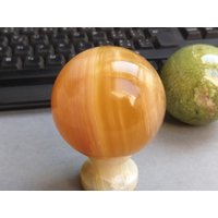Handgemachte Honig Calcit Kugel - Durchscheinender Kristall Für Warme Innenräume & Mindful Living Handgemachte Honig Calcit Kugel - Durchscheinender Kristall Für Warme Innenräume & Mindful Living von JaneFisherMinerals