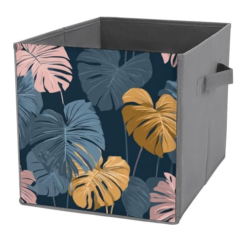 Jubonexis Aufbewahrungskörbe mit tropischen Blättern, marineblau und orange, würfelförmig, faltbar, dekorative Stoff-Aufbewahrungskörbe, Heim-Organizer mit Griffen für Regale, Schrank, 27 x 27 cm Jubonexis Aufbewahrungskörbe mit tropischen Blättern, marineblau und orange, würfelförmig, faltbar, dekorative Stoff-Aufbewahrungskörbe, Heim-Organizer mit Griffen für Regale, Schrank, 27 x 27 cm von Jubonexis