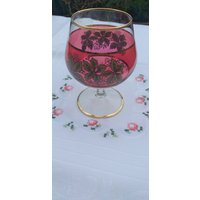 Älteres Rot-Goldenes Cognacglas Mit Blüten Älteres Rot-Goldenes Cognacglas Mit Blüten von JulesLaedchen