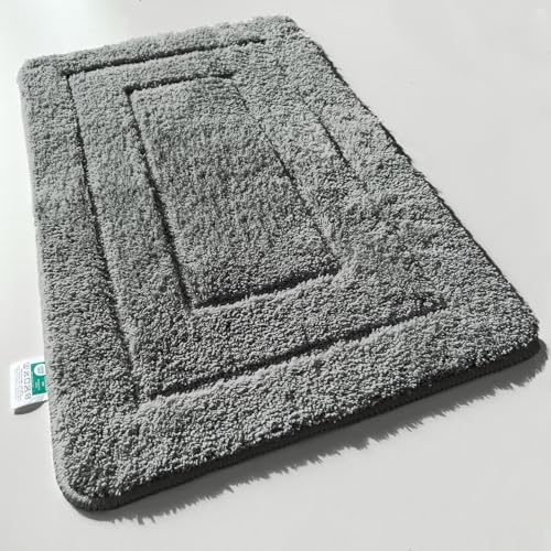 KARAT Badteppich Atlantis - extra flauschig & schnelltrocknend - Badezimmerteppich mit rutschsicherer Rückseite - Badematte Duschvorleger (60 x 100 cm, Dunkelgrau) von KARAT