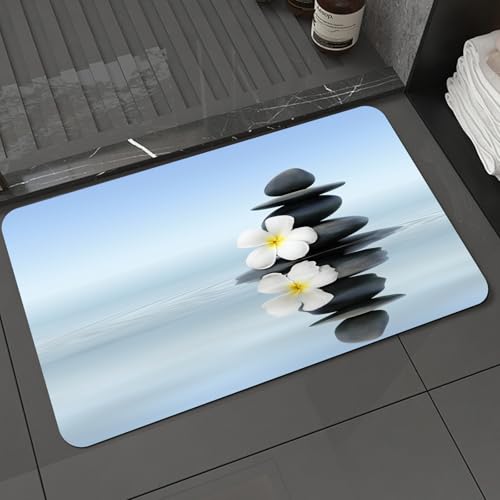 KDWJS Badematte rutschfest Super Absorbierende Badezimmerteppich,Waschbar Duschvorleger,Badewannen undBadezimmer,EIN instabiler schwarzer Stein mit Einer weißen Blume darauf, der Sich im ru,40x60 cm von KDWJS