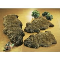 Bettumrandung aus echtem Lammfell in Tierform Bettumrandung aus echtem Lammfell in Tierform von KLINGEL DE