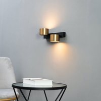 Schicke Design-Wandleuchte in Schwarz-Gold mit doppelter LED-Beleuchtung - Tango von KOSILUM