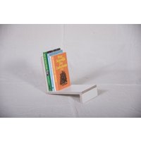 Luzy - Die Buchstütze Luzy - Die Buchstütze von KargMoebel