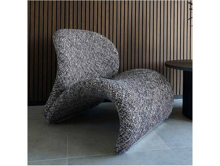 Designersessel Polstersessel in modernem Design aus Strukturstoff Designersessel Polstersessel in modernem Design aus Strukturstoff von Kauf-Unique Marketplace