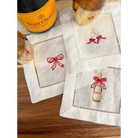 Handgestickte Urlaubsbögen Und Champagner-Cocktailservietten von KikiEhrichDesigns