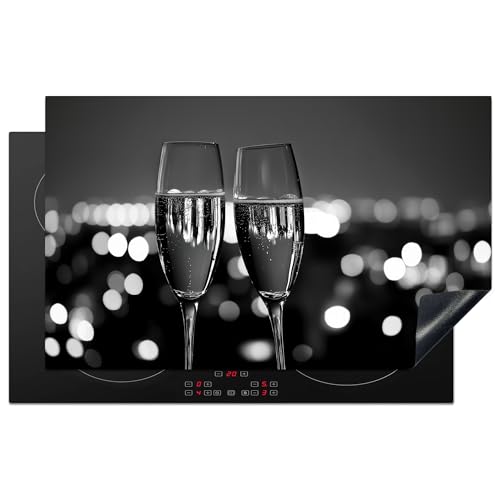 KitchenYeah© Herdabdeckplatte 83x51 cm Einteilig Herdabdeckung Abdeckplatte für Ceranfeld Abdeckung Induktionskochfeld Aufrollbare Matte Blasen - Prost - Champagnergläser - Lichter der Stadt von KitchenYeah