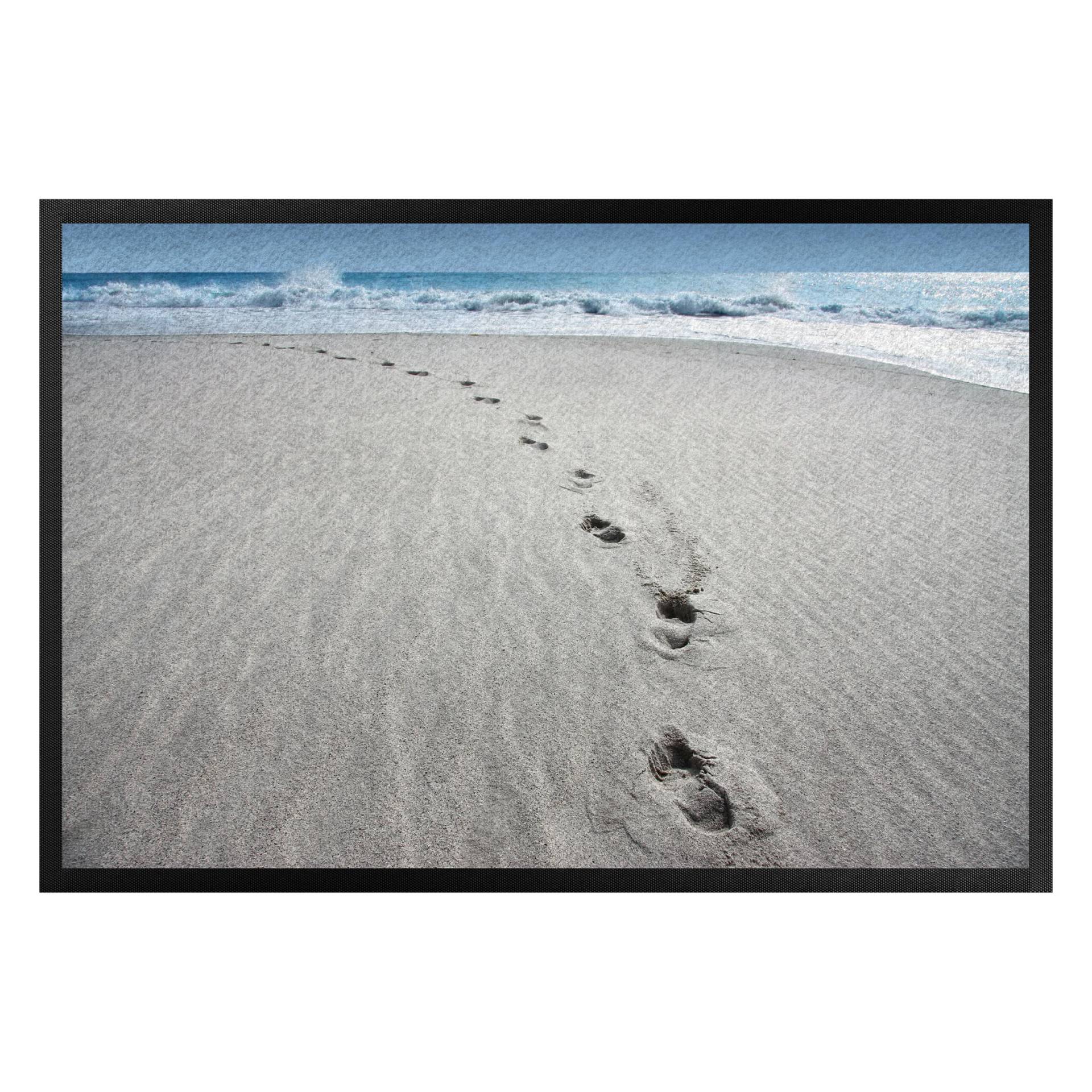 Fußmatte Spuren im Sand von Klebefieber