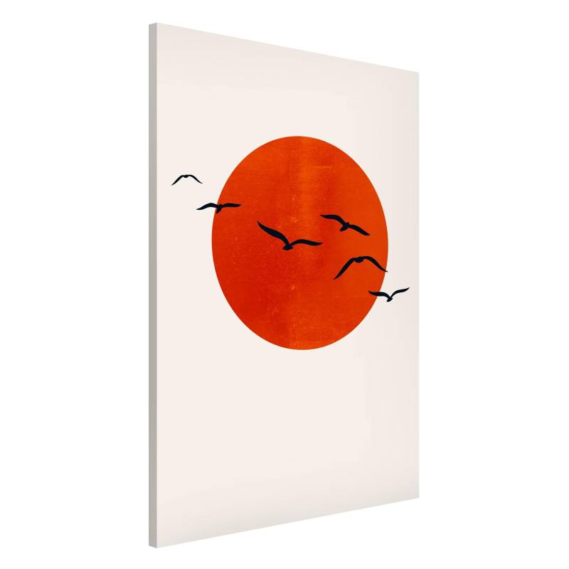 Magnettafel Vogelschwarm vor roter Sonne I von Klebefieber