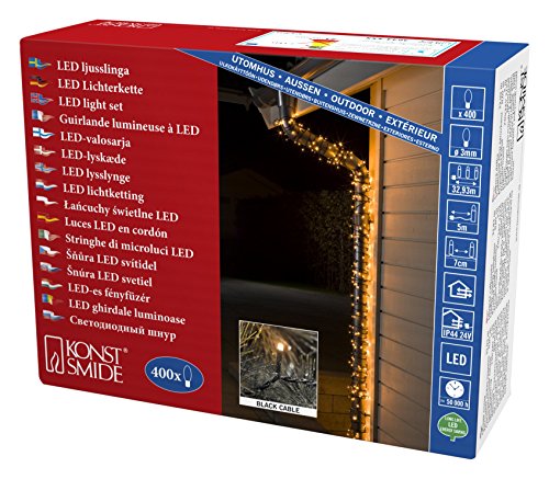 Konstsmide 3644-800 Micro LED Lichterkette / für Außen (IP44) / VDE geprüft / 24V Außentrafo / 400 bernsteinfarbene Dioden / schwarzes Kabel, 400 LEDs von Konstsmide