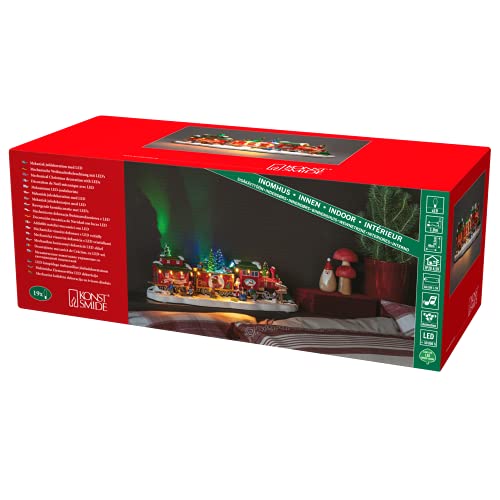 Konstsmide LED Szenerie Zug mit zwei Waggons und rotierendem Weihnachtsbaum, mit Musik, 19 bunte Dioden, 4,5V Innentrafo/batteriebetrieben, schwarzes Kabel, Batterie: 3 x AA 1, 5V (exkl.) - 4235-000 von Konstsmide