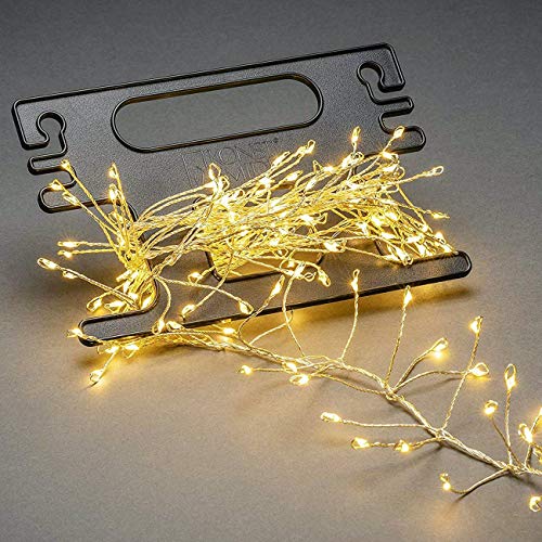 Konstsmide Micro LED Büschellichterkette Cluster, mit Aufroller, 400 bernsteinfarbene Dioden, 12V Außentrafo, silberfarbener Draht - 6471-890 Konstsmide Micro LED Büschellichterkette Cluster, mit Aufroller, 400 bernsteinfarbene Dioden, 12V Außentrafo, silberfarbener Draht - 6471-890 von Konstsmide