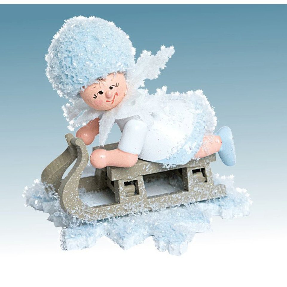 Kuhnert Dekofigur Kuhnert Schneeflöckchen mit Schlitten, Handarbeit aus dem Erzgebirge von Kuhnert