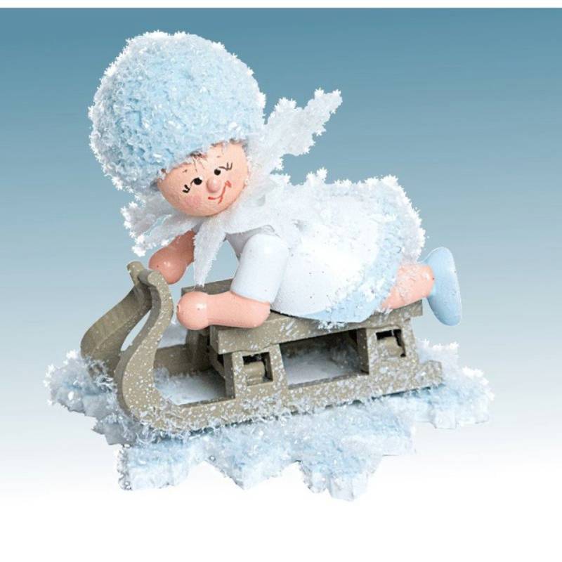 Kuhnert Dekofigur Kuhnert Schneeflöckchen mit Schlitten, Handarbeit aus dem Erzgebirge Kuhnert Dekofigur Kuhnert Schneeflöckchen mit Schlitten, Handarbeit aus dem Erzgebirge von Kuhnert