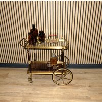 Formschöner Hollywood Regency 60Er 70Er Jahre Teewagen Barwagen Messing/Glas Servierwagen Maison Bagues Stil 2 Tabletts von LOOKandVINTAGE