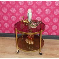 stabiler 60Er 70Er Messing/Glas Teewagen Barwagen Rund Beistelltisch Rauchglas Vintage Hollywood Regency Mid Century von LOOKandVINTAGE