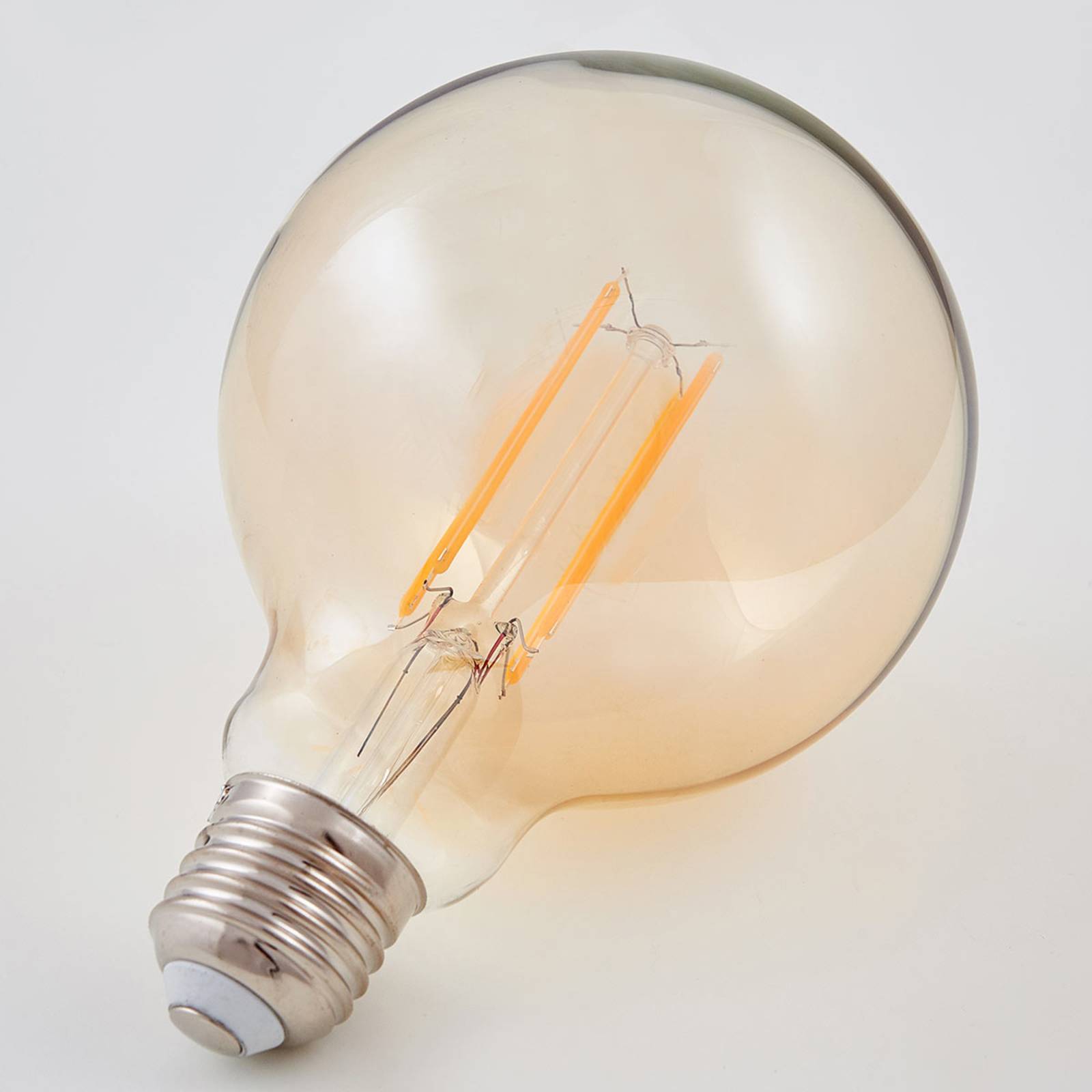 E27 LED-Globelampe Filament 6W 500lm, amber 1.800K von LINDBY