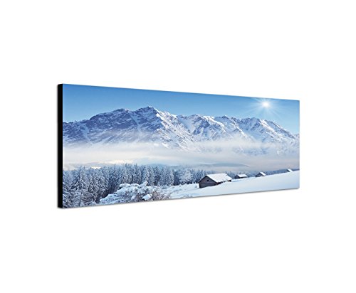 Wandbild auf Leinwand als Panorama in 150x50cm Winterlandschaft Berge Wald Häuser Schnee von Leinwandparadies