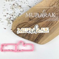 Eid Mubarak in Verity Schrift Ausstecher & Embosser, Postkasten Ideen, Ausstecher, Religiöse Feiern, Ramadan Keksstempel Eid Mubarak in Verity Schrift Ausstecher & Embosser, Postkasten Ideen, Ausstecher, Religiöse Feiern, Ramadan Keksstempel von LissieLoves