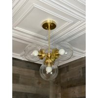 Sofort Lieferbar - Versand Am Selben Tag Vega Modern 4 Light 6 In. Globe Mid Century Kronleuchter von LustrousLumens